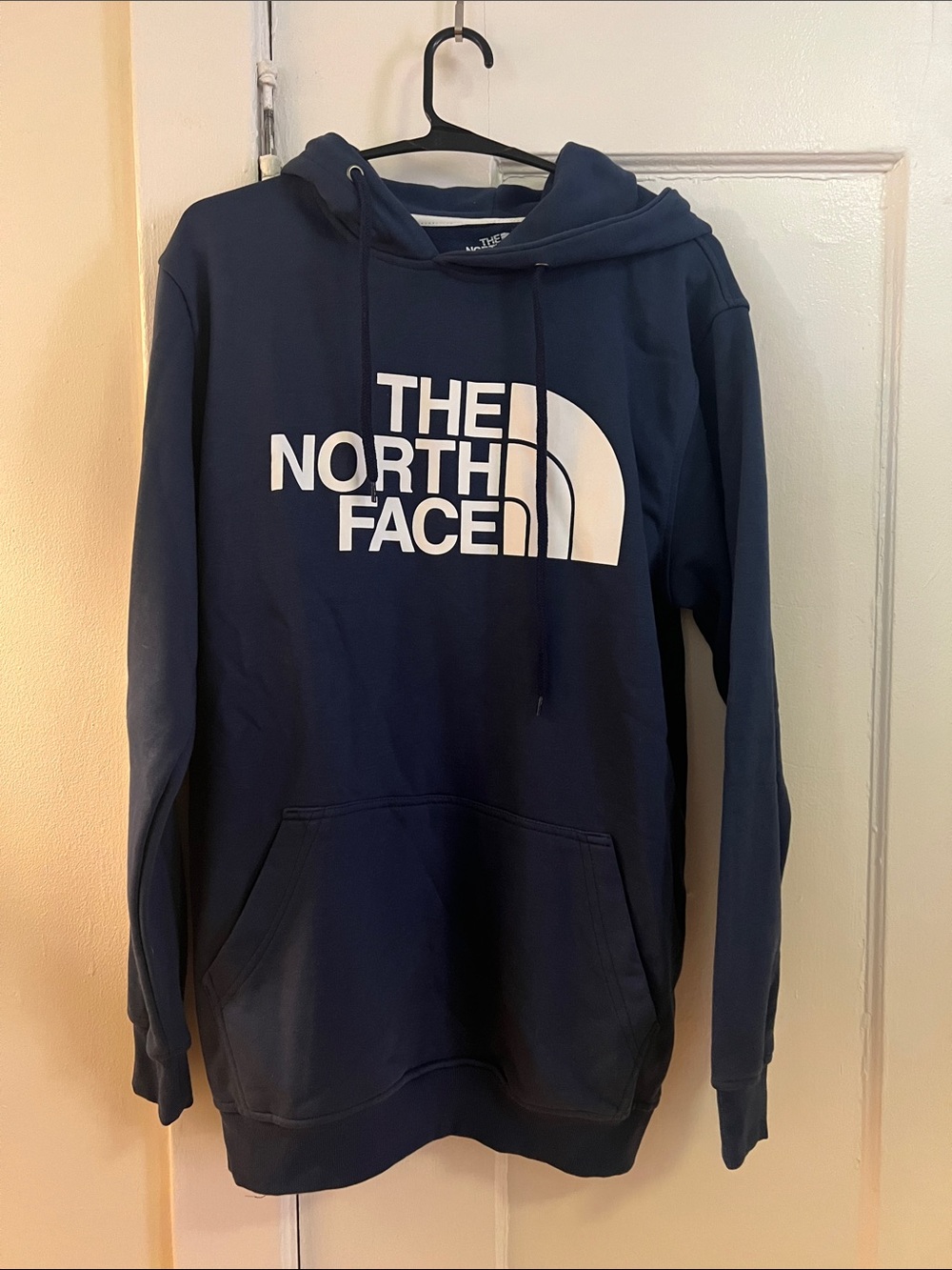 The North Face Navy Blue Hoodie with White Logo
